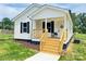 Charming single-story home with a welcoming front porch and newly installed stairs at 159 Hallman St, Cherryville, NC 28021