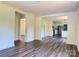 Spacious living room with hardwood floors and abundant natural light, perfect for entertaining at 159 Hallman St, Cherryville, NC 28021