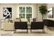 Cozy living room featuring a neutral color palette, comfortable seating, large window, and stylish decor at 1613 Spring Lot Dr, Edgemoor, SC 29712