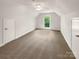Bonus room features carpet, two closets, and large window at 1625 Winthrop Ln, Monroe, NC 28110