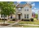 Charming townhome with a welcoming front yard and an American flag displayed at 1720 Fleetwood Dr, Charlotte, NC 28208