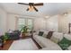 Bright and spacious living room with hardwood floors and comfortable furnishings at 1720 Fleetwood Dr, Charlotte, NC 28208