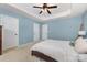 Large main bedroom featuring tray ceilings, neutral paint, and two closets at 1720 Fleetwood Dr, Charlotte, NC 28208