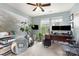 Home office with two windows and large plant makes working at home enjoyable at 1720 Fleetwood Dr, Charlotte, NC 28208