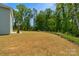 A very large backyard with privacy provided by the wooded perimeter at 197 Park View Dr, Stanfield, NC 28163