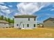 This home features a spacious backyard with a basketball hoop at 197 Park View Dr, Stanfield, NC 28163