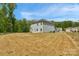 This home offers a expansive backyard at 197 Park View Dr, Stanfield, NC 28163