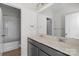 Clean bathroom with double sinks, a large mirror, and a shower and tub combo at 197 Park View Dr, Stanfield, NC 28163