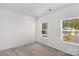 Bright bedroom with large windows providing ample natural light and neighborhood views at 197 Park View Dr, Stanfield, NC 28163
