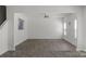 Spacious living room with vinyl floors, neutral walls, and ceiling fan at 197 Park View Dr, Stanfield, NC 28163