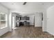Open living space with modern kitchen, plenty of natural light, and vinyl floors at 197 Park View Dr, Stanfield, NC 28163