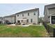 Large backyard with a concrete patio, dining set, and fenced yard, great for pets or children at 2014 Burton Point Ct, Waxhaw, NC 28173