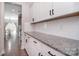 Modern kitchen featuring granite countertops and white subway tile backsplash at 2014 Burton Point Ct, Waxhaw, NC 28173