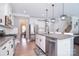 Modern kitchen with stainless steel appliances, granite countertops, and center island at 2014 Burton Point Ct, Waxhaw, NC 28173