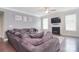 Cozy living room features a fireplace, TV, and comfortable seating, perfect for relaxing at 2014 Burton Point Ct, Waxhaw, NC 28173