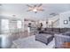 Open floor plan with kitchen, dining area, and living room, creating a seamless and inviting space at 2014 Burton Point Ct, Waxhaw, NC 28173