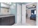 Beautiful main bathroom with a tile shower, soaking tub, double vanity and en-suite bedroom access at 2014 Burton Point Ct, Waxhaw, NC 28173