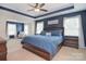 Spacious main bedroom with tray ceiling, ceiling fan, and bright natural light at 2014 Burton Point Ct, Waxhaw, NC 28173