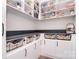 Spacious pantry with ample shelving and countertop space for storage at 2014 Burton Point Ct, Waxhaw, NC 28173