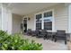 Inviting front porch with comfortable seating and a charming welcome sign at 2014 Burton Point Ct, Waxhaw, NC 28173