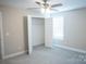 Bedroom with carpet flooring, closet and ceiling fan at 206 N Kayla Dr, Salisbury, NC 28146