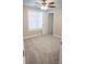 Bedroom with neutral carpet and paint, ceiling fan, window and closet at 206 N Kayla Dr, Salisbury, NC 28146