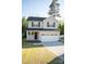 Light gray two-story home with a spacious two-car garage and green lawn at 206 N Kayla Dr, Salisbury, NC 28146