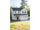 Two story home features a well-maintained lawn and a two-car garage at 206 N Kayla Dr, Salisbury, NC 28146