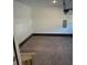 Bright garage with a concrete floor, brick perimeter and white walls at 206 N Kayla Dr, Salisbury, NC 28146