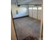 Spacious garage with high ceilings, windows and concrete floors at 206 N Kayla Dr, Salisbury, NC 28146