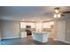 Modern kitchen with white cabinets, granite countertops and stainless steel appliances at 206 N Kayla Dr, Salisbury, NC 28146