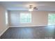 Open and airy living room with luxury vinyl floors and sliding doors to deck at 206 N Kayla Dr, Salisbury, NC 28146