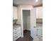 Spacious pantry showcasing ample storage with white cabinets and granite counters at 206 N Kayla Dr, Salisbury, NC 28146