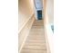 Carpeted stairway featuring white railings leading to the upper level at 206 N Kayla Dr, Salisbury, NC 28146