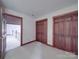 Bedroom with closet space and an open doorway to a hallway at 209 Tinkham Trl, Cramerton, NC 28032
