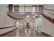 Grand foyer with hardwood floors, staircase, and elegant trim at 209 Tinkham Trl, Cramerton, NC 28032