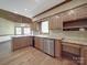 Well-appointed kitchen with stainless steel appliances and granite counters at 209 Tinkham Trl, Cramerton, NC 28032