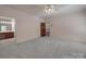 The spacious main bedroom includes an ensuite bathroom and walk-in closet at 209 Tinkham Trl, Cramerton, NC 28032
