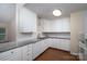 Updated kitchen boasts granite countertops, white cabinets and stainless steel appliances at 211 W Tennessee Ave, Bessemer City, NC 28016