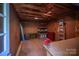 Workshop area with shelving, workbench, and storage solutions at 211 W Tennessee Ave, Bessemer City, NC 28016