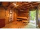 Spacious workshop area with workbench, pegboard, and ample storage space at 211 W Tennessee Ave, Bessemer City, NC 28016