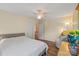 Cozy bedroom with neutral tones, hardwood floors, and a serene atmosphere at 21907 Torrence Chapel Rd, Cornelius, NC 28031