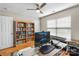 Cozy bedroom with ample storage, a comfortable workspace, and lots of natural light at 21907 Torrence Chapel Rd, Cornelius, NC 28031