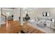 Bright living and dining areas featuring hardwood floors and an open-concept design at 21907 Torrence Chapel Rd, Cornelius, NC 28031