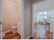 Half bath with toilet and vanity at 2380 Fairport Se Dr, Concord, NC 28025