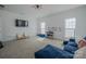 Entertaining bonus room with a wall-mounted tv and comfortable seating, perfect for Gathering time at 2380 Fairport Se Dr, Concord, NC 28025
