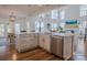 Bright kitchen with island, stainless steel dishwasher, and open floor plan at 2380 Fairport Se Dr, Concord, NC 28025