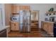 Spacious kitchen featuring stainless steel appliances and wood cabinetry at 2380 Fairport Se Dr, Concord, NC 28025