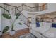 Stylish living room with a grand staircase, hardwood floors, and comfortable seating area at 2380 Fairport Se Dr, Concord, NC 28025