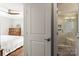 Bathroom featuring a modern shower and next to a bedroom at 241 Wakefield Dr # C, Charlotte, NC 28209